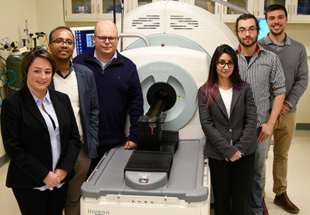 Collaborators on the article, pictured in the Molecular Imaging Lab at the Beckman Institute: from left, Iwona T. Dobrucka, Dipanjan Pan, Wawrzyniec Dobrucki, Jamila Hedhli, Aaron Schwartz-Duval, and Christian J. Konopka.